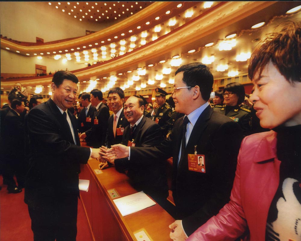 公司董事長許仲秋參加全國二會并與國家主席習(xí)近平握手 